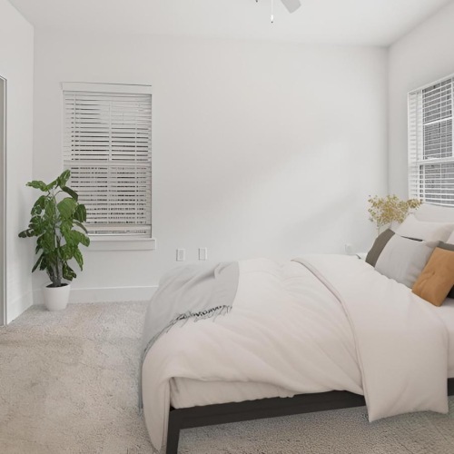 a bright bedroom with touches of nature